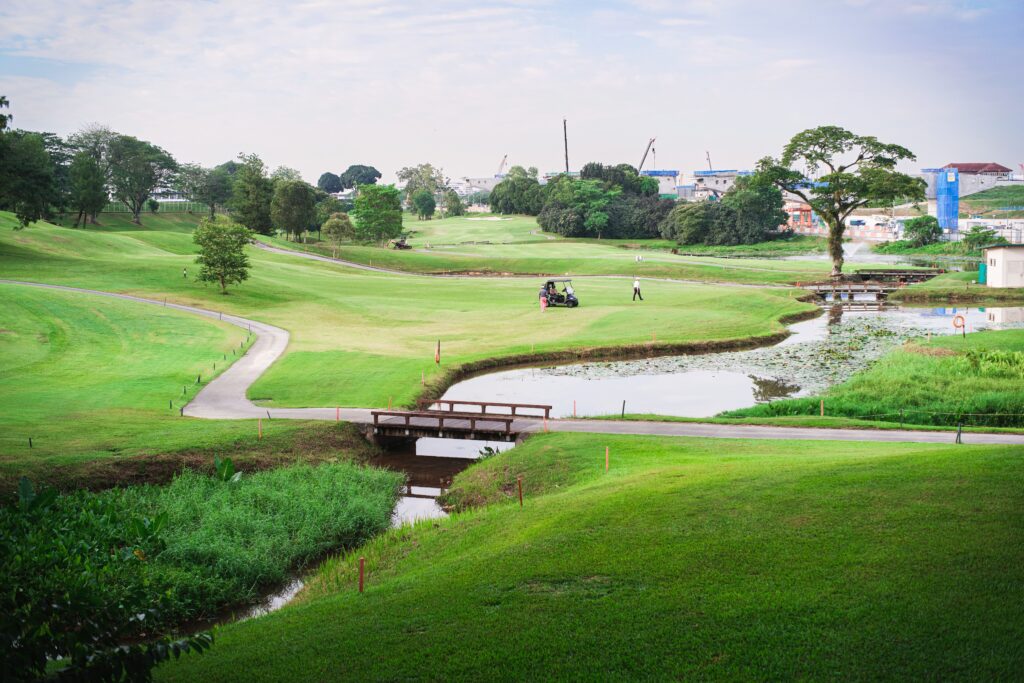 Golf course with river and bridge