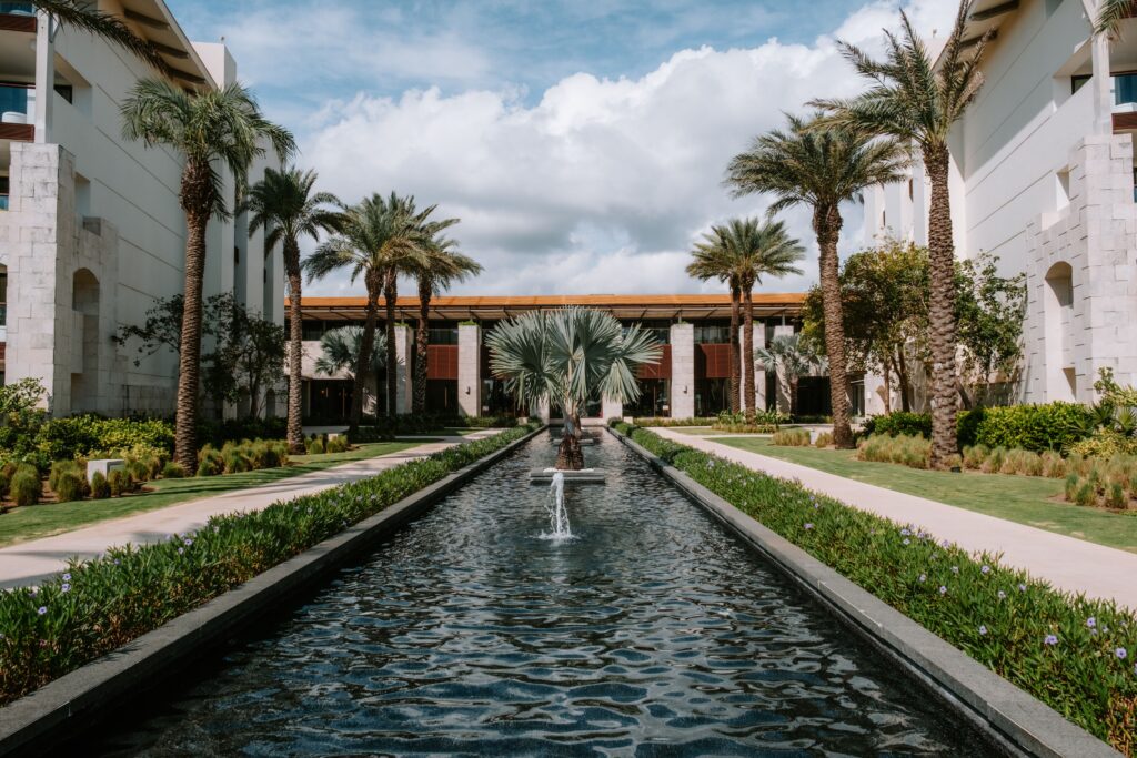 Hotel with long pool and fountain